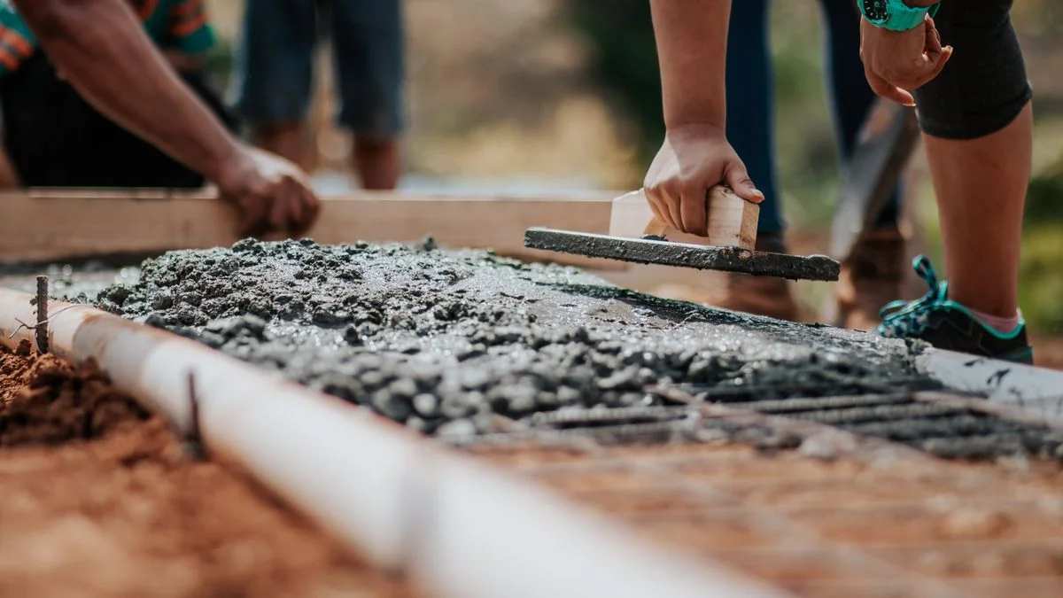 Wells Fargo partners with ICON to offer mortgage incentives for 3D-printed homes, featuring ICON construction-scale 3D printer building residential walls