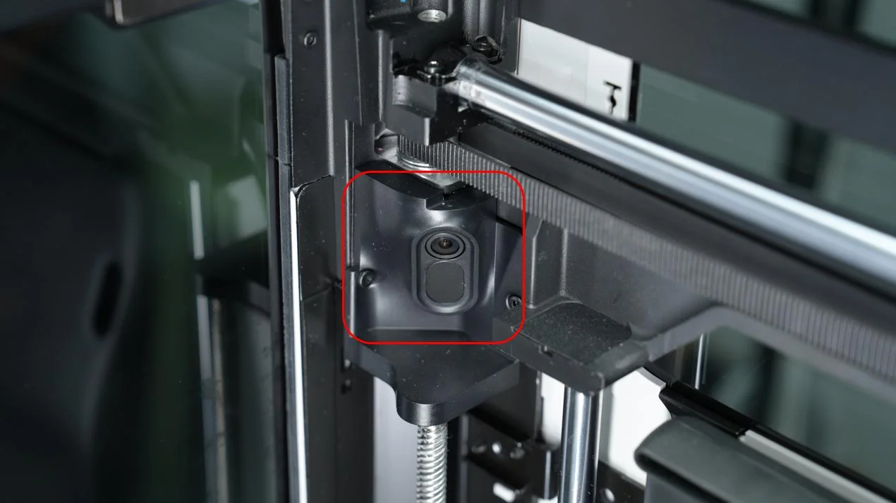 Nozzle-mounted camera module on a Bambu Lab 3D printer used for AI print monitoring
