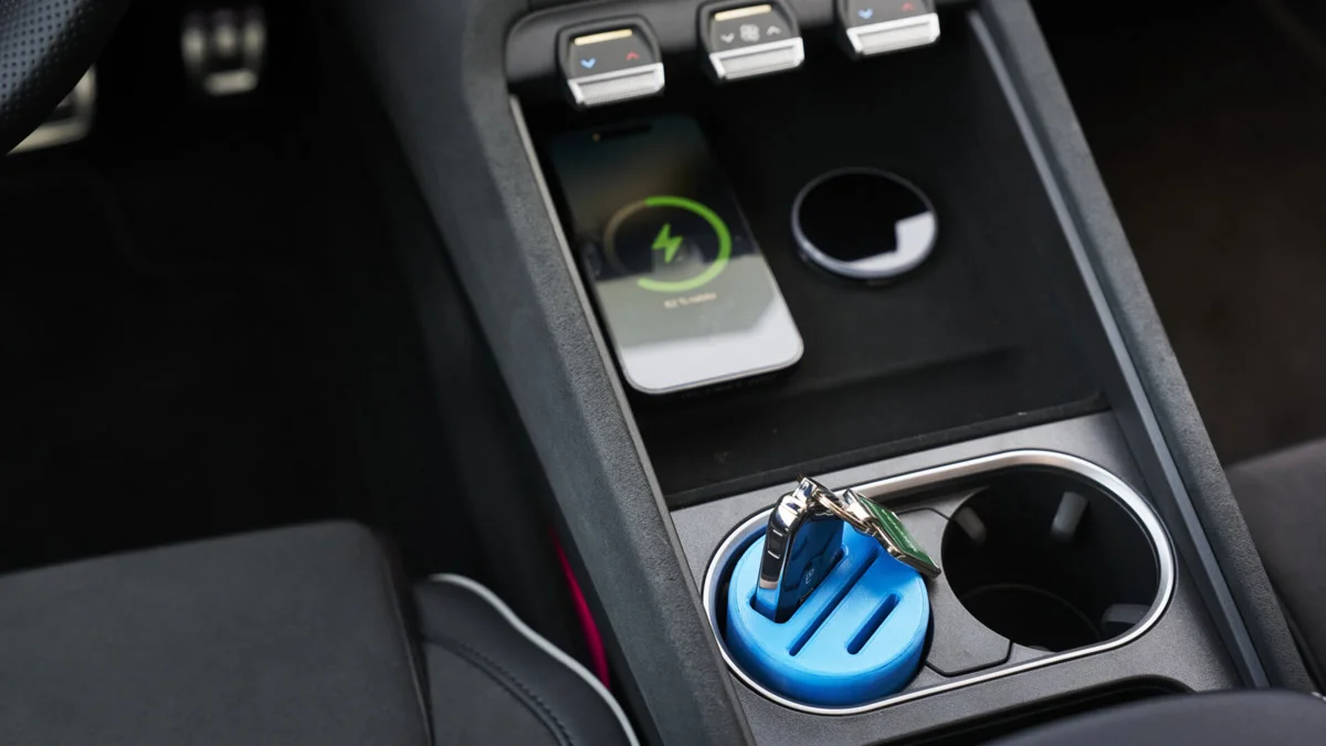 Blue 3D printed cupholder insert fitted in a Skoda center console